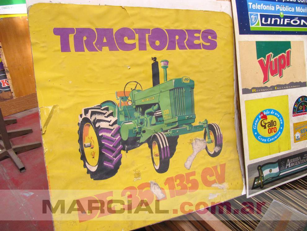 Afiche impreso por Marcial Seigrafía para la fábrica de tractores John Deere. Afiche realizado en cartulina e impreso en el año 1967